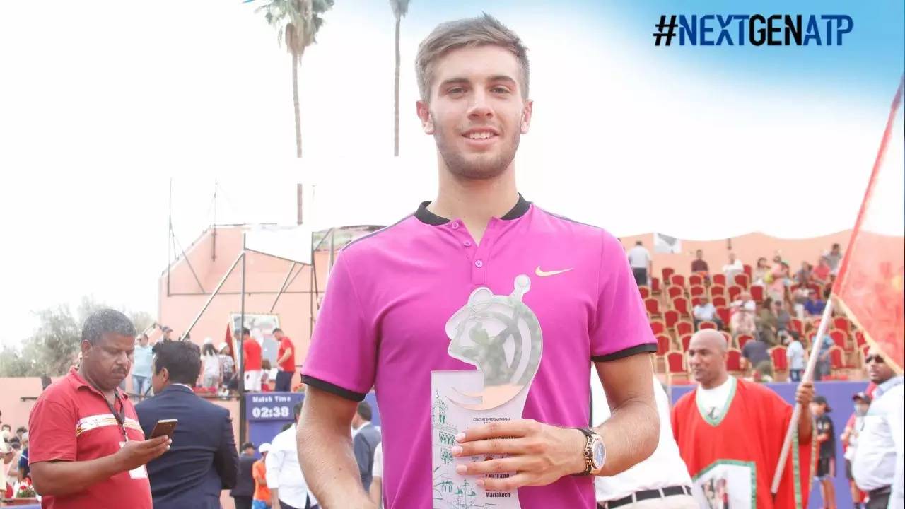  丘里奇挽救赛点逆转，草地热身赛爆冷门